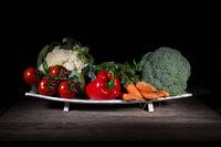 Still life, vegetables on a fruit bowl.