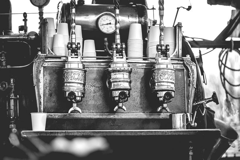 Vintage industrial fired coffee machine on coal and steam. by Fotografiecor .nl
