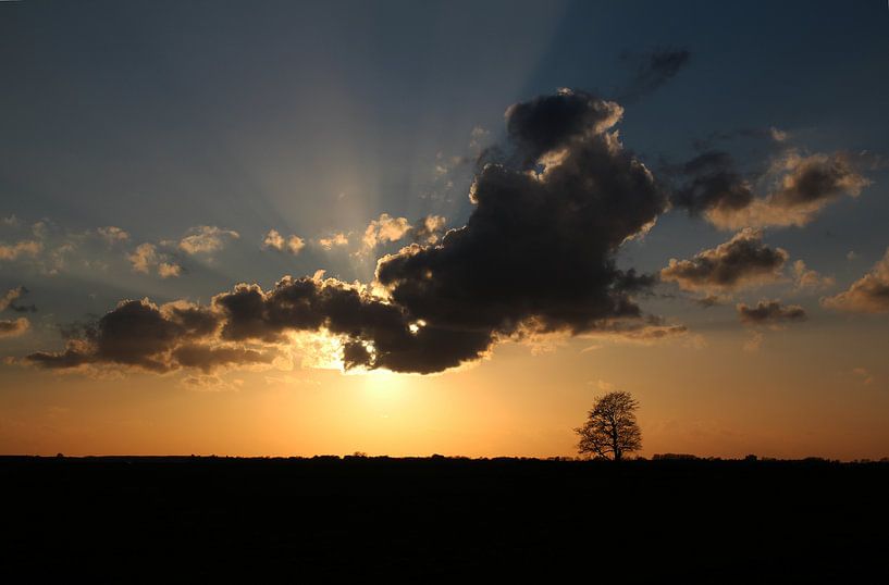 Sun behind the clouds by Guido Veenstra