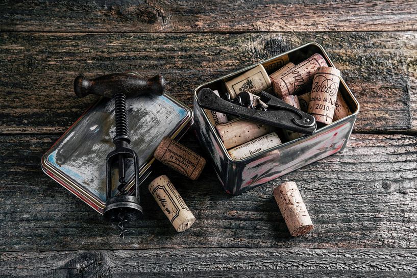 old tin with cork and corkscrew by Jürgen Wiesler
