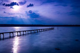 Sunset at the lake with long jetty by Frank Herrmann