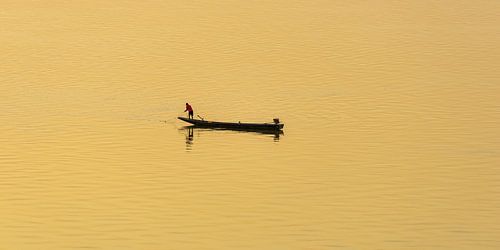 In de gouden stilte van de Mekong