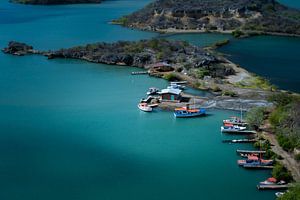 Drone like view of a fishing village on Curacao van Bfec.nl