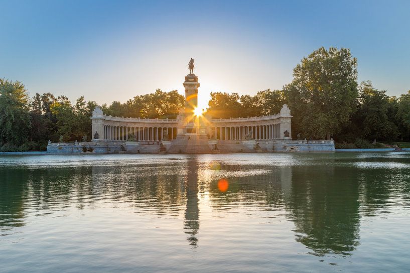 The rowing lake of the park Retiro and the monument to Alfonso XII in Madrid at sunrise by Kim Willems