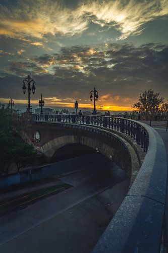 Pont de pierre in Bordeaux at sunrise. by André Scherpenberg