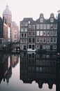 Amsterdam - grachtenpanden met St Nicolaaskerk van Thea.Photo thumbnail