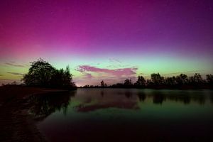 Northern lights in the night sky over the in The Netherlands