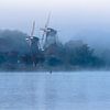 Molens in de mist 2 van Peter Dane