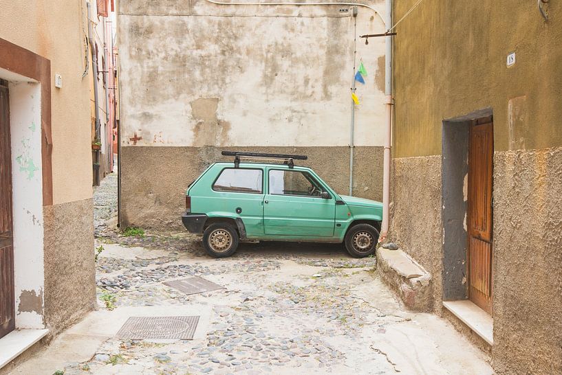 Mint green car in an Italian street by Ellen Metz