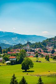 Oberstaufen Church in summer from afar by Leo Schindzielorz