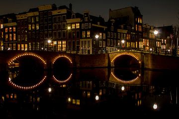 De grachten van Amsterdam in de nacht van Hans de Waay