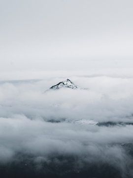 top above the clouds by Teun de Leede