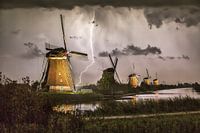 Lightning at the illuminated windmills of Kinderdijk