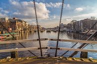Le pont Skinny et la rivière Amstel à Amsterdam - 3 par Tux Photography Aperçu