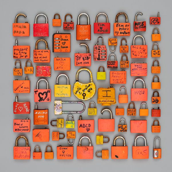 Love locks in orange and yellow. by Floris Kok