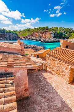 Idyllic view of beautiful coast with traditional stone houses by Alex Winter