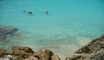 Snorkeling in crystal clear water by Nicole