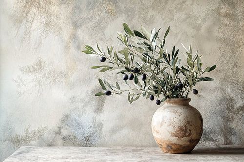 Olive branches in rustic vase