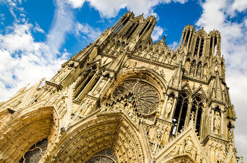 Facade and portal of the gothic cathedral of Reims France by Dieter Walther