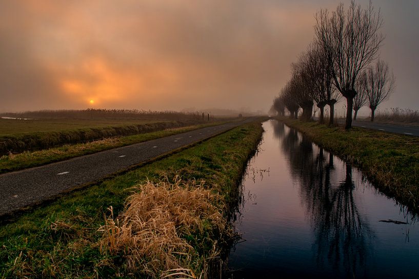 Sunset in the fog by Ton de Koning