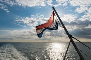 Waddenzee met Nederlandse vlag