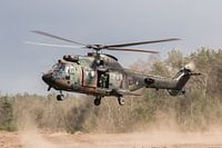 Hubschrauber in Staubwolke