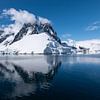 Mountain reflection in Antarctica by Nancy Pauwels Photo