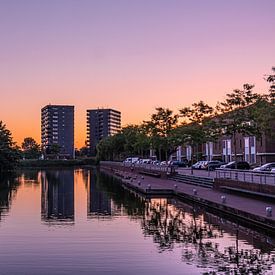 Coucher de soleil avec les 2 tours résidentielles de Veenendaal sur Rick van de Kraats