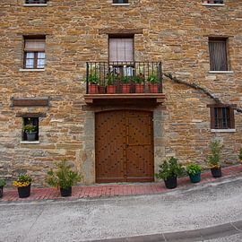 Gable Gable with decoration of wrought-iron rivets in the door by Ton Van Zeijl