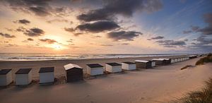 Maisons de plage de Texel au coucher du soleil sur John Leeninga