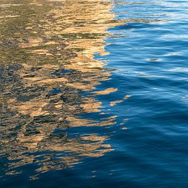 Golden yellow reflections in blue seawater 6 by Adriana Mueller