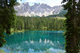 Reflection mountains in turquoise water Karersee Lago di Carezza Sud Tirol Italy