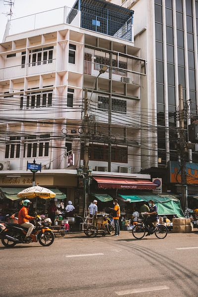 Bangkok's Vibrant Street Life: A Dynamic Urban Symphony by Ken Tempelers