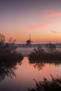Sunrise at mill in the polder