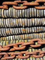 Rope with chains in the harbour of Lauwersoog