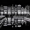 Tour boats and buildings in Amsterdam by Ton de Koning