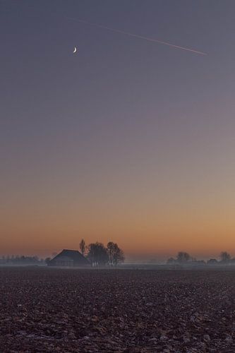 Maan bij zonsondergang