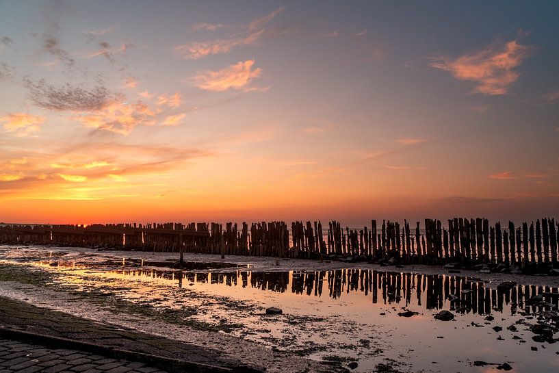 beautiful colours and reflection during sunset at the Wadden Sea by Jeroen van Deel