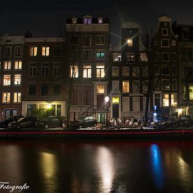 Amsterdam in de avond sur Twan Remmerswaal