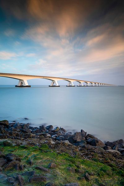 Sunrise behind the Zeeland bridge in the province of Zeeland by gaps photography