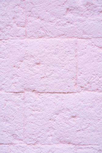 Roze stenen muur met textuur