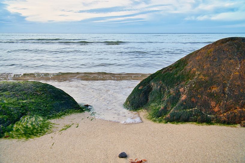 Large stones on a sandy beach in Denmark by Martin Köbsch