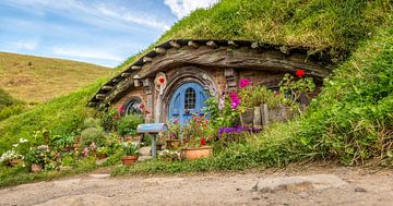 Hobbit-huisje in Hobbiton Shire, Nieuw-Zeeland van Troy Wegman