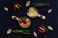 Herbs and spices on wooden spoons by Francis Dost thumbnail