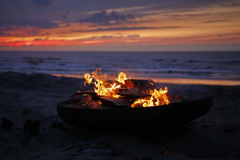 Fire basket on beach by Monique van Middelkoop