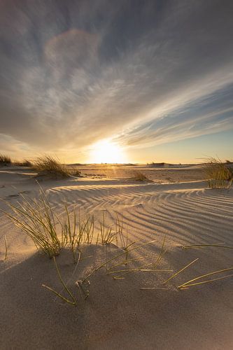 Zonsondergang op het strand van Zeeland