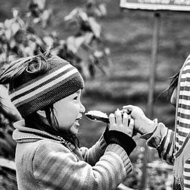 Sharing lunch (Sa Pa, Vietnam) by Michiel Kramer
