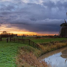 Ominous sky over windmill Meervogel by Ron Buist