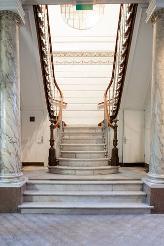 in an old mansion there is a marble staircase by Marcel Derweduwen