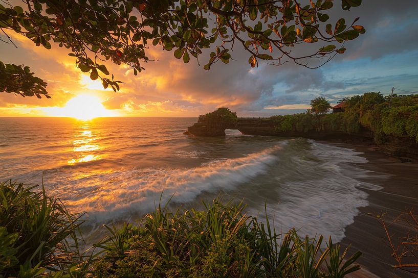 Bali Indonesia, Temple on rock by ocean with sunset by Rudolfo Dalamicio
